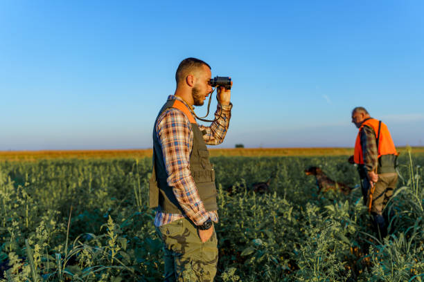 hunters in a field