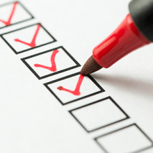 A column of checkboxes with three red checkmarks